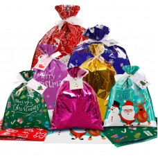 Christmas Gift Wrapping Bags,35pcs Chrismtas Goodie Bags in 4 Sizes and 7 Designs with Ribbon Ties and Tags for Christmas Party Xmas Santa Holiday Birthday Goody Present Party Bags.